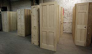 A photo of door slabs and pine door blanks